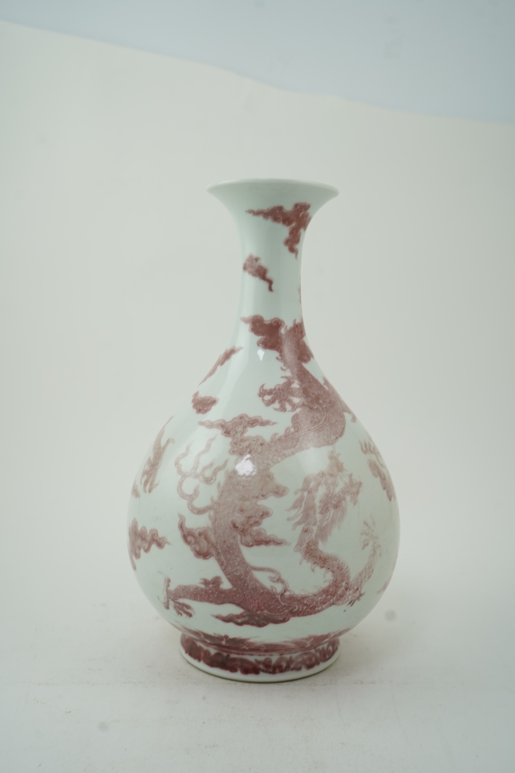 A Chinese underglaze copper-red ‘dragon’ bottle vase, yuhuchunping